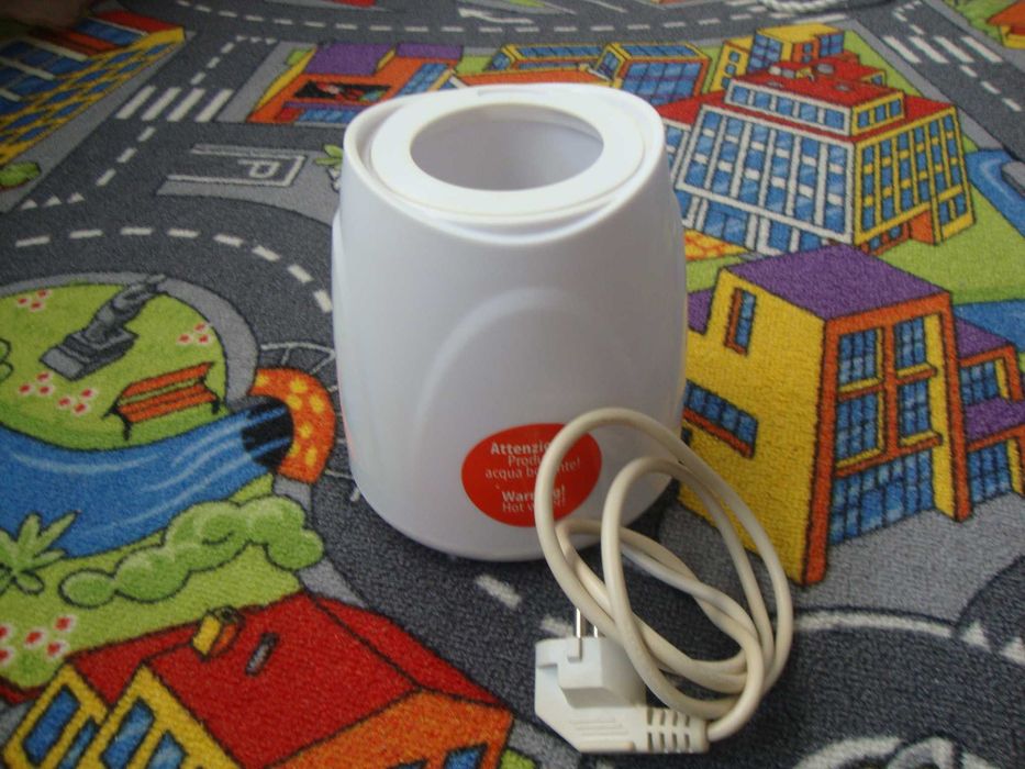 Sterilizator nou de biberoane cu aburi Laica BC1005+încălzitor Laica.