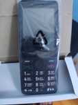 Телефон TCL onetouch