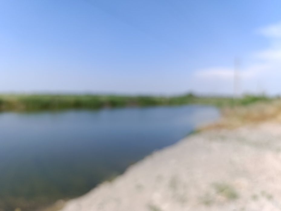 Земля на Ташморе вдоль реки