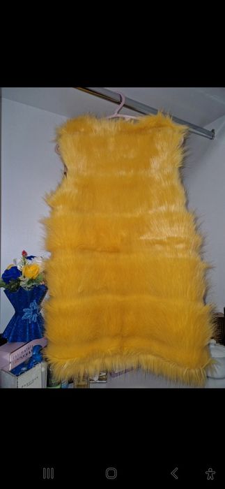 Vesta blana artificial