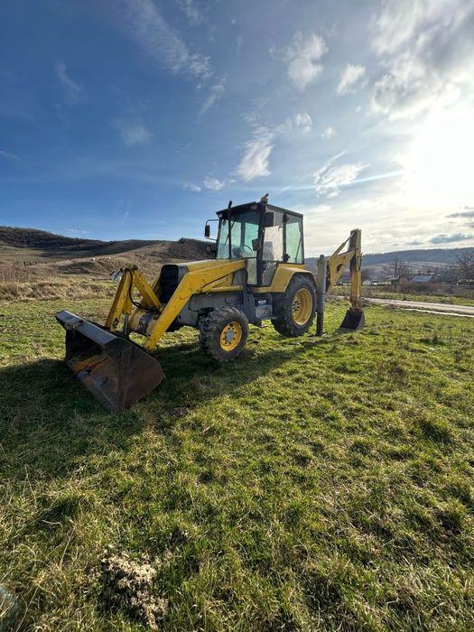 Vand buldoexcavator mf 750