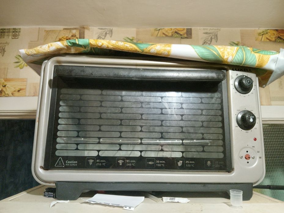 Продам духовку мясорубку