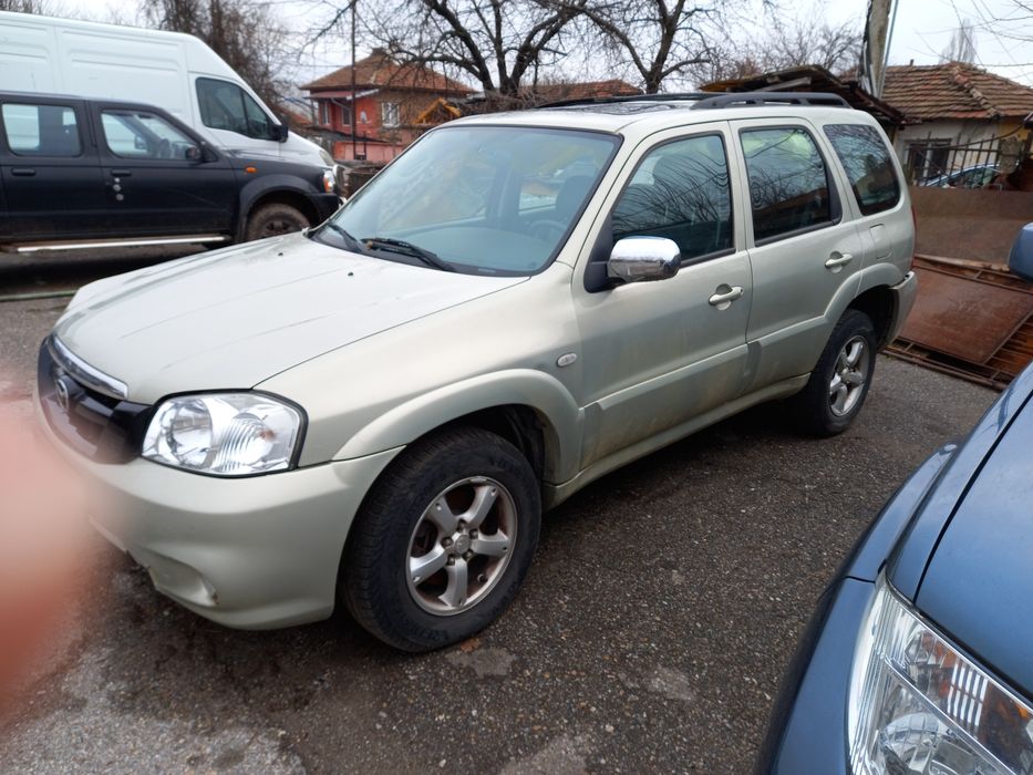 Мазда Трибют на части