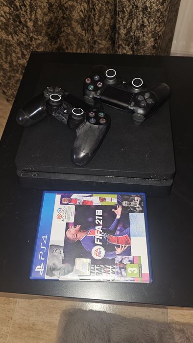 PS4 Slim 500GB + 2 controllere + GTA V + FIFA 21 – gata de joacă!