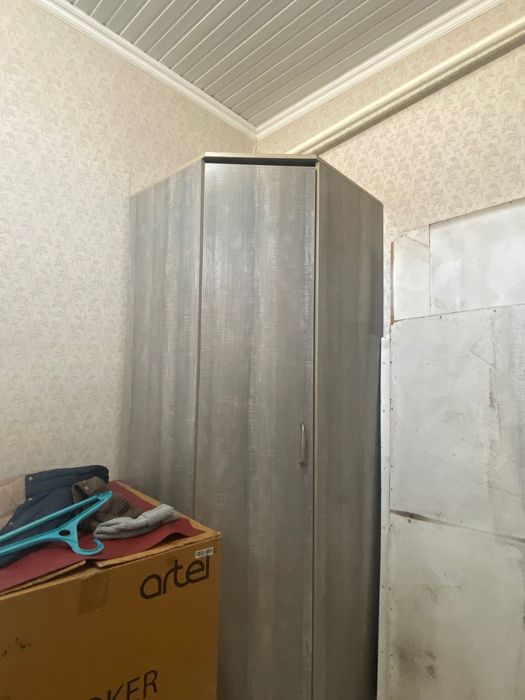 Шкаф угловой серого цвета