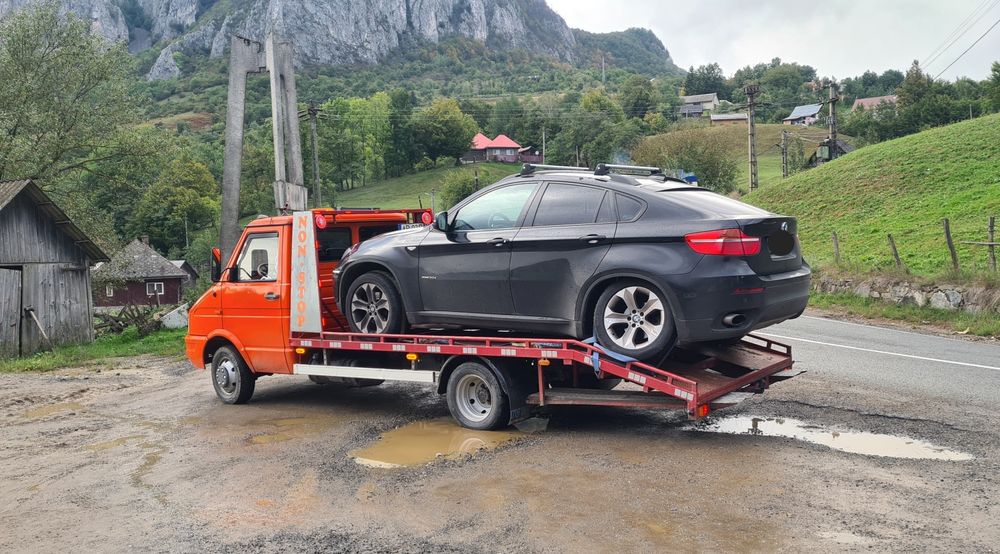 Tractari auto platforma transport utilaje trailer slep recovery