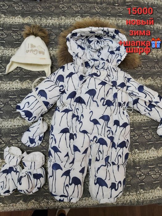 Продам зимний новый комбинезон