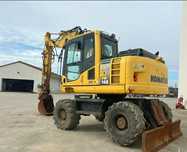 Excavator  pe roți Komatsu PW 148-8