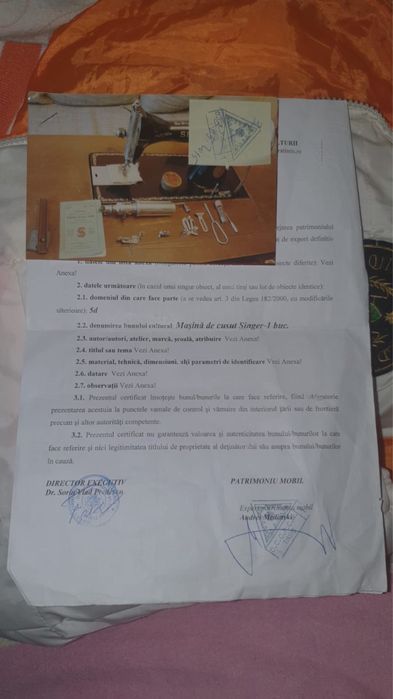 Mașină de cusut Singer