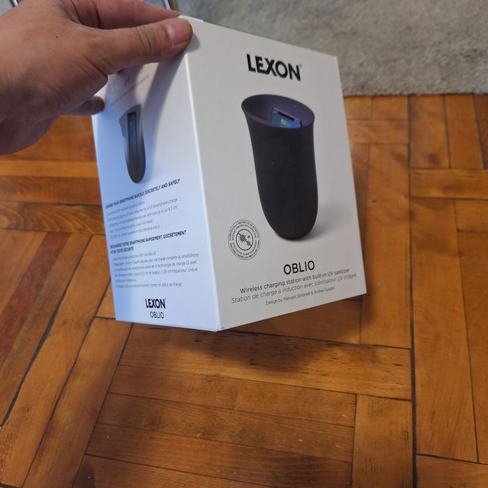 Statie de incarcare & dezinfectare telefon.