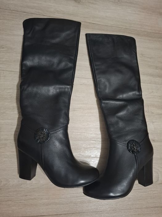 Продам новые сапоги