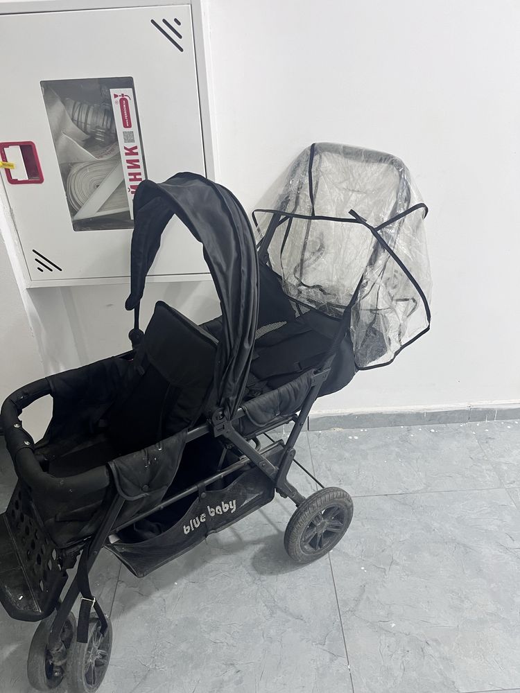 Коляска для погодок
