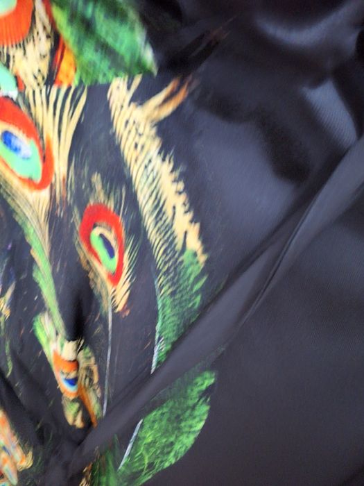 Rochie eleganta de la Dames.  Model impresionant cu paun