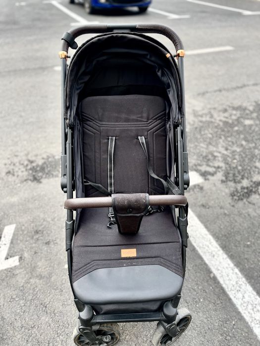 Carucior cu maner reversibil