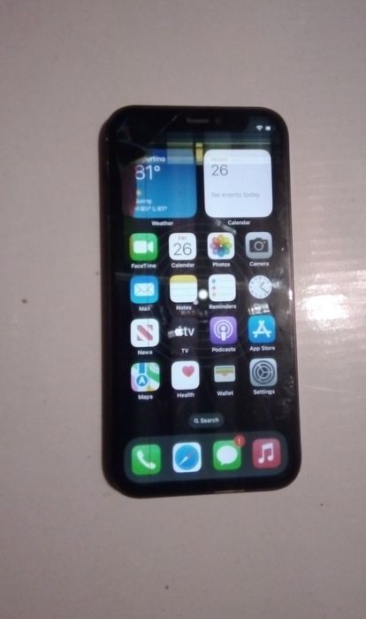 iPhone 12 mini cu bateria 83%