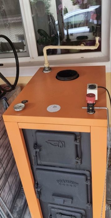 Cazan pe combustibil solid Magdolna 37KW, dotat cu termostat Watts.