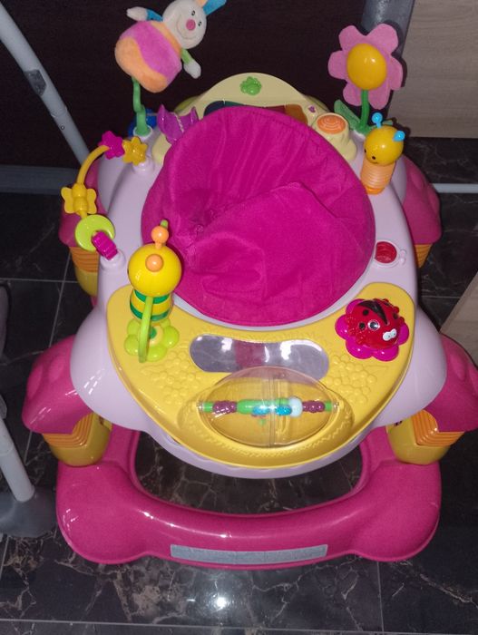 Premergător bebe cu jucării interactive – stare foarte bună