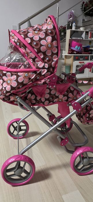 Cărucior păpuși roz
