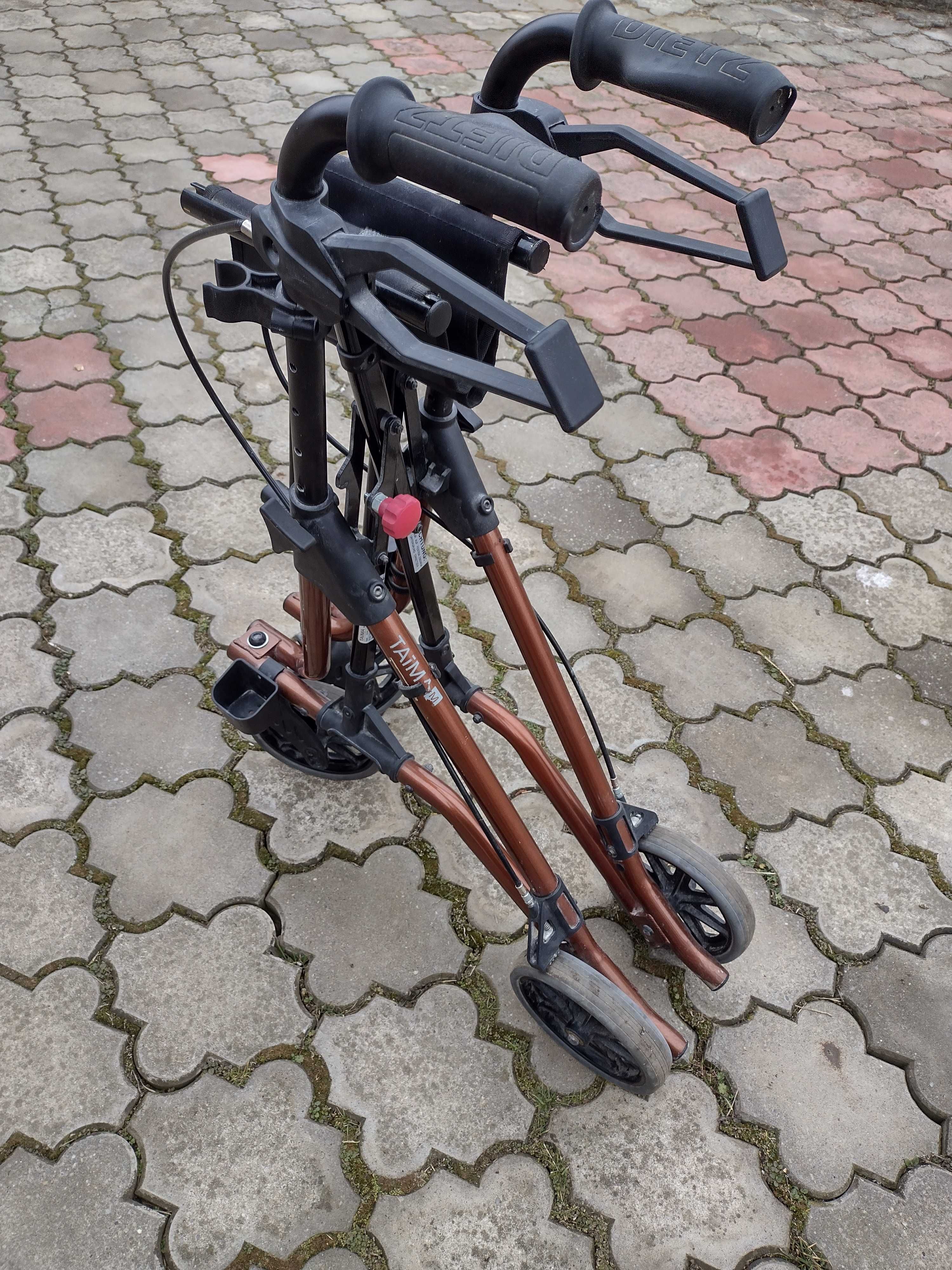 Cadru pliabil cu scaun si roti , carucior