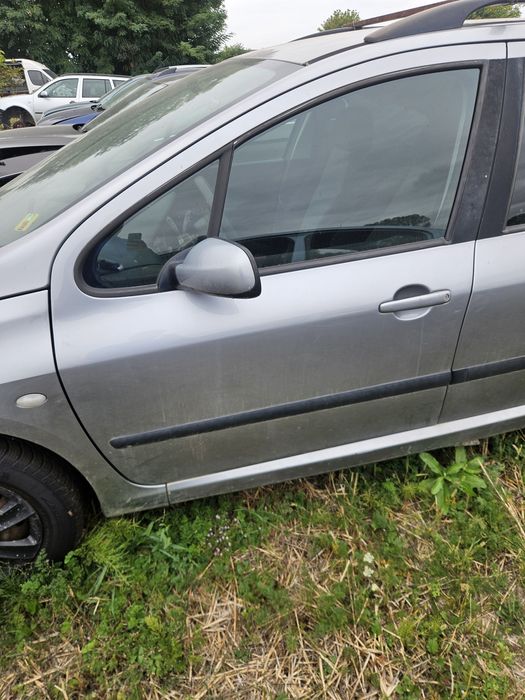 Usa stanga fata peugeot 307 1.6 hdi