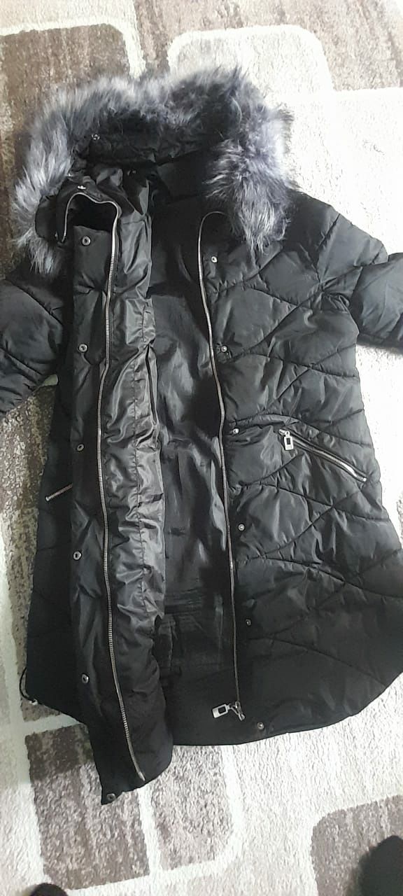Тёплая куртка 48-размера