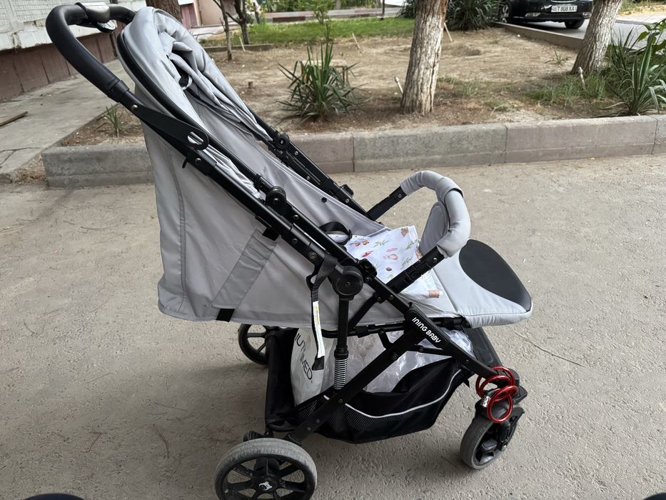 Детская коляска ининг бебии