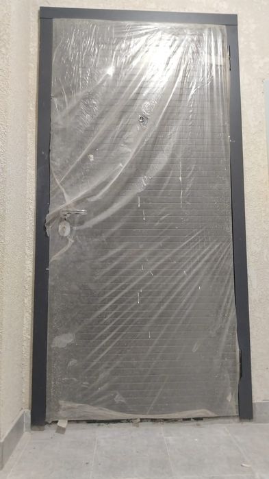 Сыртқы есік қаланың үй