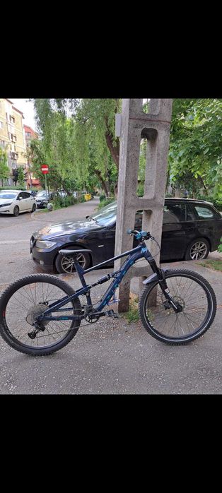 Vând bicicleta full suspension