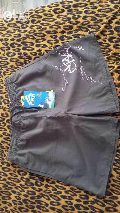 De vânzare pantaloni scurți