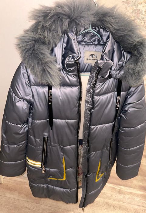 Продам зимний пуховик.