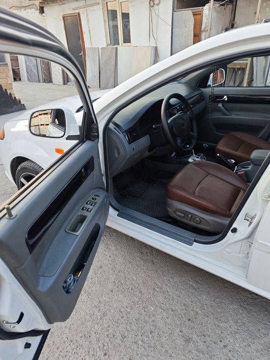 Lacetti 1.8 2009 gentra qilingan