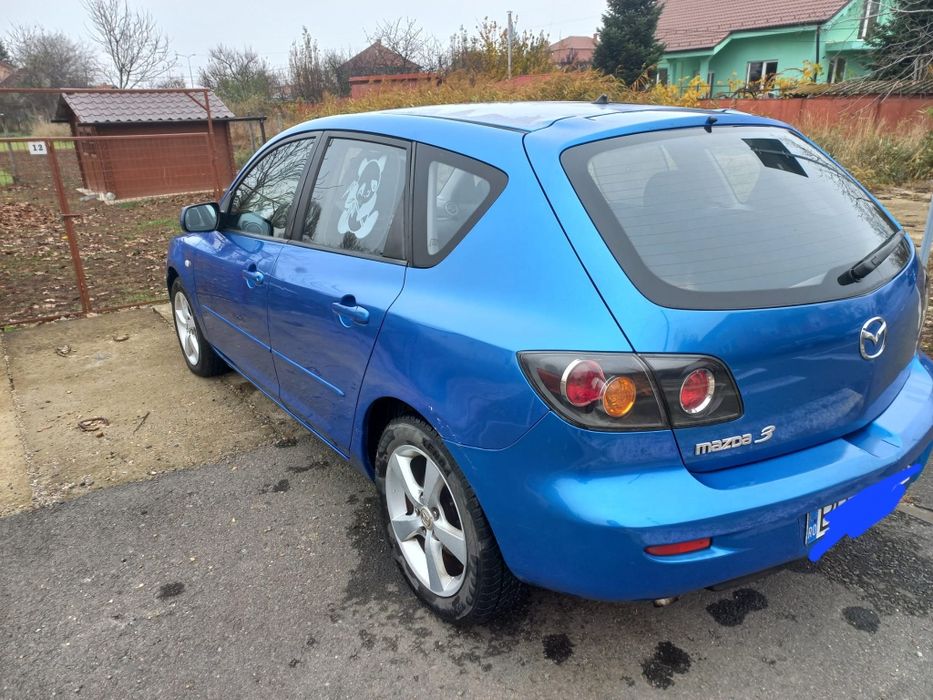 Vand masina Mazda 3