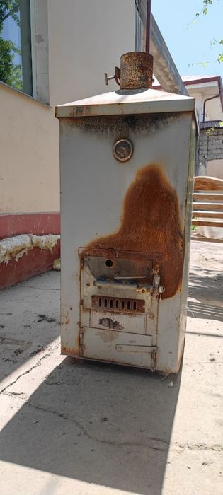 Котёл отопительный многотопливный КОМ-16