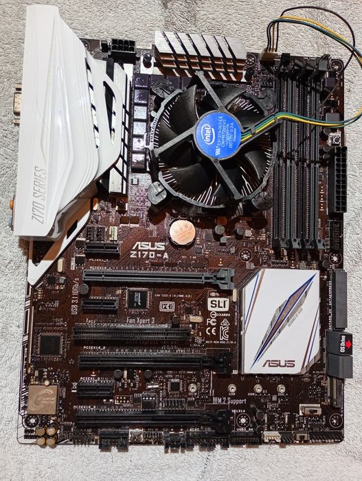 Placa de baza ASUS Z170-A. 
Este o placă de bază ATX cu socket LGA