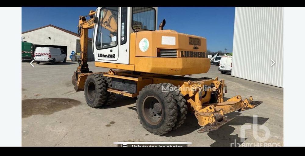 Excavator Liebherr pe roți