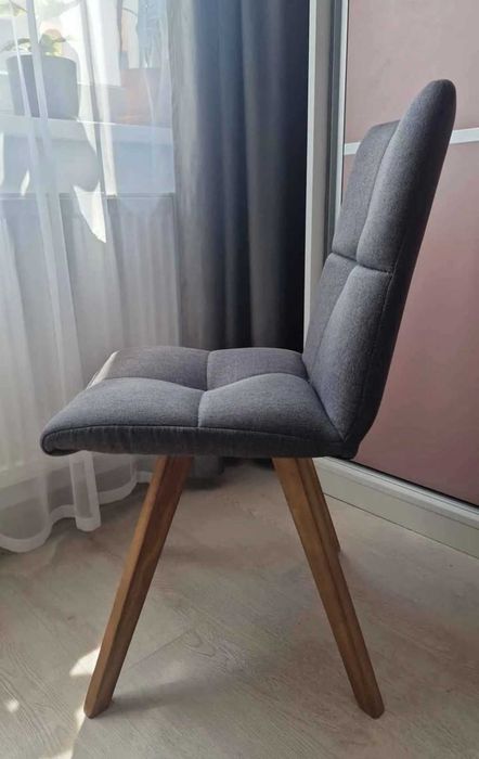 Scaun gri modern tapițat, confortabil, în stare excelentă