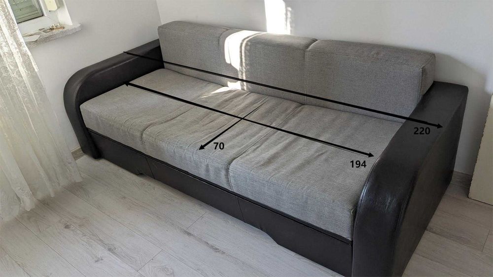 Canapea extensibila cu lada de depozitare.