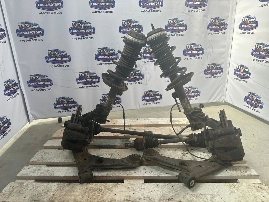 amortizoare / arcuri amortizoare / disc frana / bascula / planetare / suport etrier - dreapta /