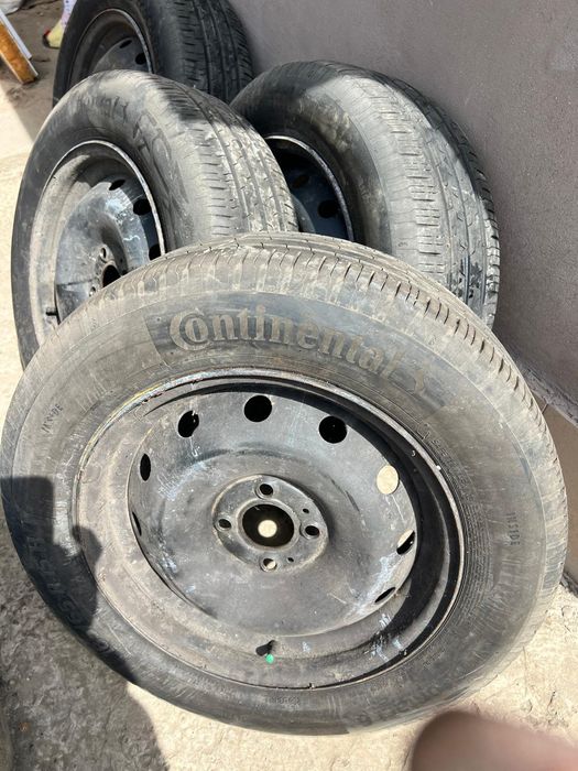 Jante 4x100+anvelope continental 185 65 r15 (Dacia Logan)