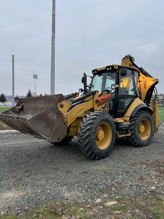 Buldoexcavator CAT 444 F . 2015