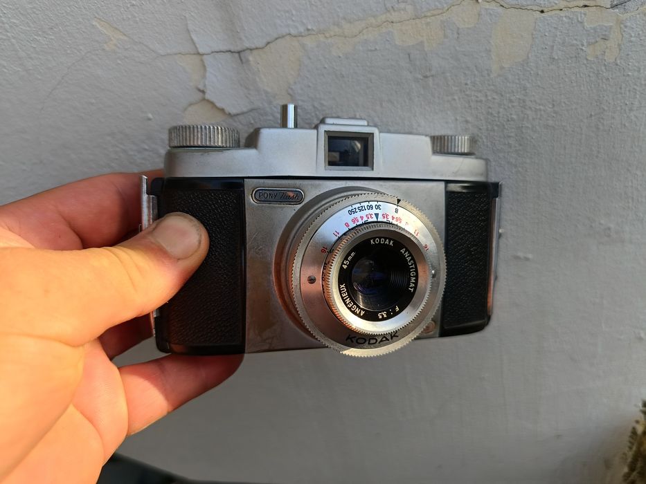 Два  фотоапарата Kodak и Смяна