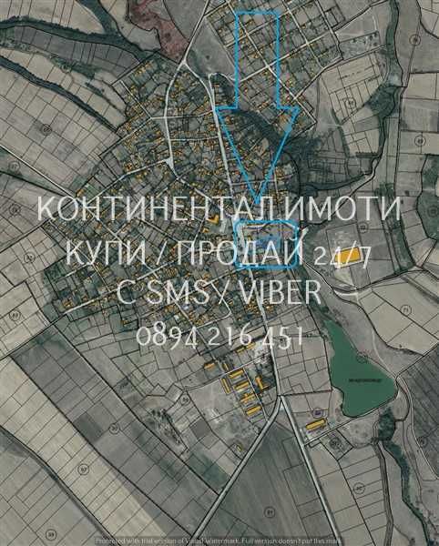 код 63001. Парцел 3800м2 в центъра на селото с лице на главната улица