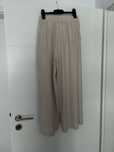 Pantaloni bej largi H&M