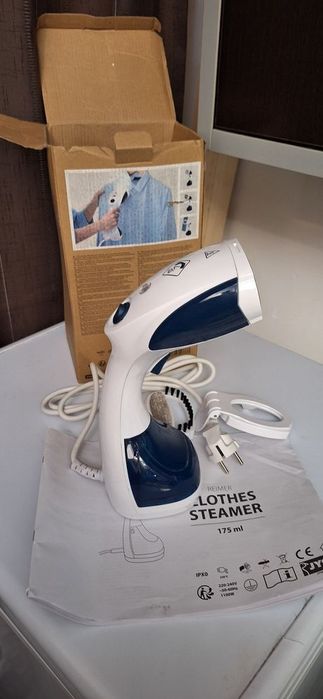 Aparat de călcat cu aburi