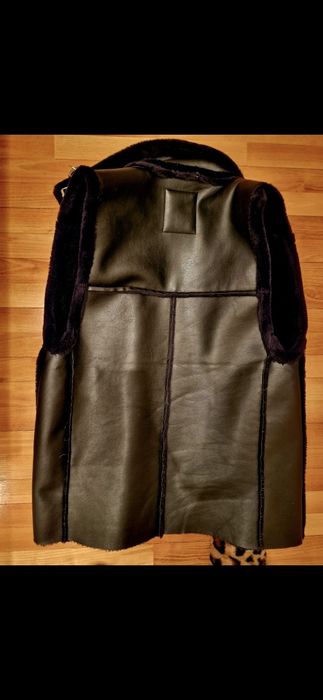 Vesta din blanita artificiala