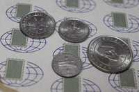 Коллекционные монеты Тенге