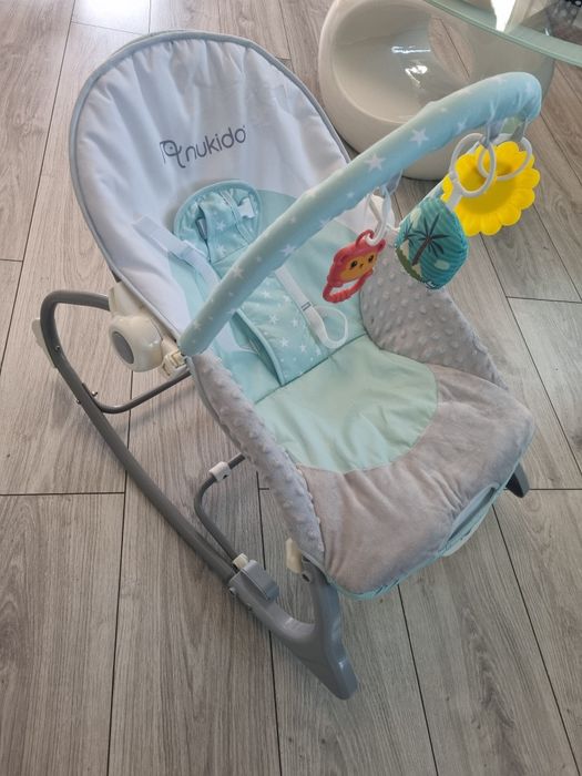 Balansoar multifuncțional cu vibrații