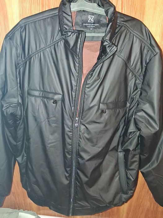 Стильная куртка от дождя.