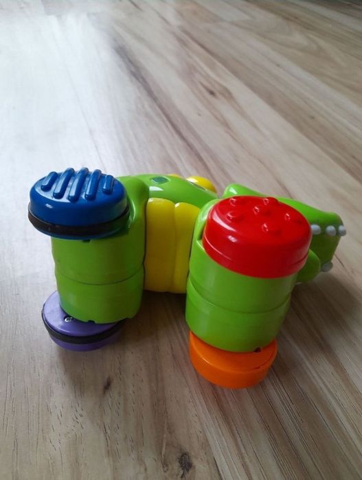joc Jucarie bebelusi Fisher Price Crocodil apasa merge

crocodil cu ro