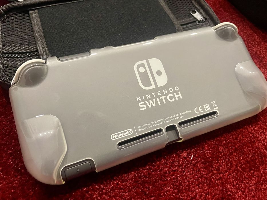 Nintendo Switch lite + accesorii impecabil